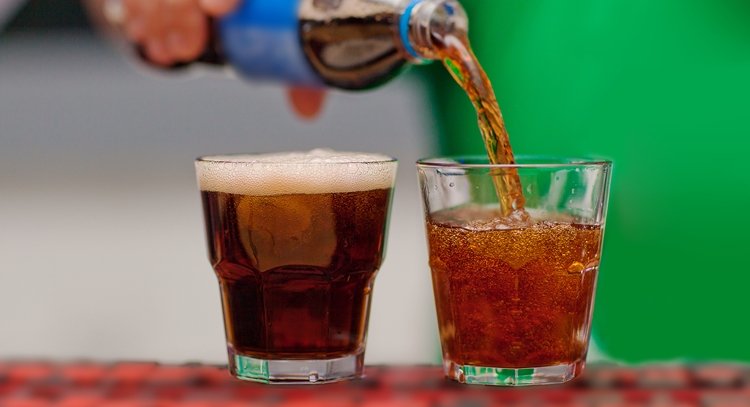 Carbonated drink poured into a glass
